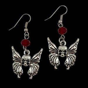 Silver-tone Winged Skull Earrings Red Crystal Accent